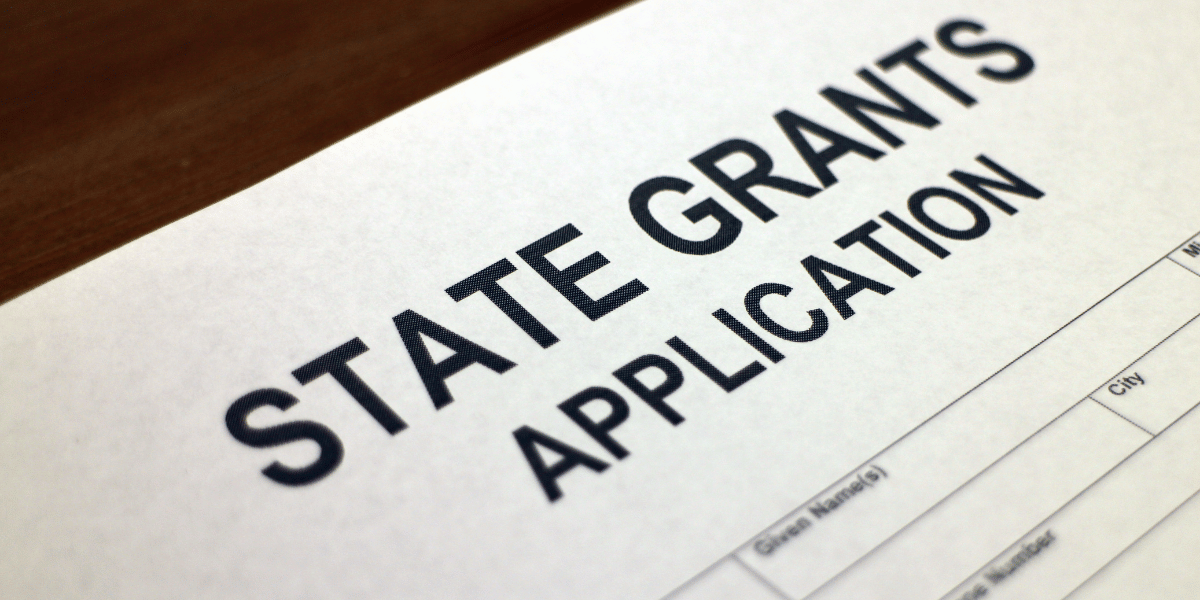 A state grant application on a desk